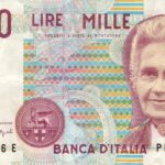 Vecchie Lire con l'immagine di Maria Montessori, simbolo della valuta italiana e dell'educazione.