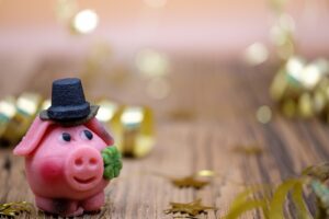 Immagine di un gratta e vinci "Portafortuna" con simboli di fortuna e vincite.