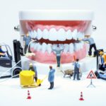 Immagine di protesi dentarie con testo informativo sul bonus sociale per famiglie a basso ISEE.